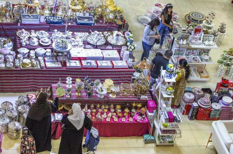 DUBAI, UNITED ARAB EMIRATES, 04 May 2018 - Shoppers checking out different items at Ramadan Market that opens May 3 till 19 at  Dragon Mart 2.  Leslie Pableo for The National for Ellen Fortini's story