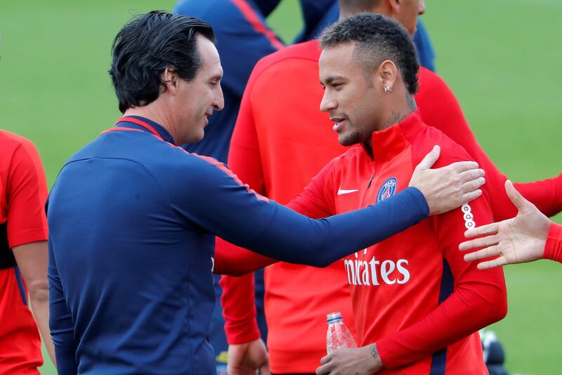 Football Soccer - Paris St Germain Training - Centre Ooredoo, Saint Germain-en-Laye, France - September 6, 2017. Paris Saint-Germain coach Unai Emery and Neymar of Brazil attend a training session. REUTERS/Charles Platiau