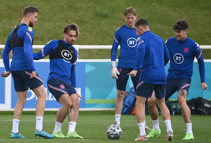 Jordan Henderson, Jack Grealish, Jordan Pickford, Kieran Trippier and John Stones  attend an England training session at St George's Park.