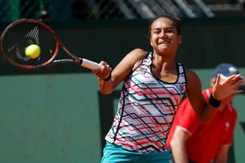 Heather Watson of Britain returns the ball to Elena Vesnina of Russia during the French Open tennis tournament at the Roland Garros stadium in Paris May 29, 2012.     REUTERS/Francois Lenoir (FRANCE  - Tags: SPORT TENNIS)  