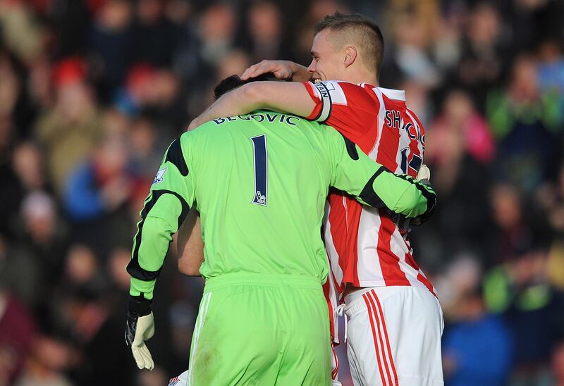 STOKE ON TRENT, ENGLAND - NOVEMBER 02: Asmir Begovic (L) of Stoke City is congratulated by team-mate Ryan Shawcross after scoring the opening goal during the Barclays Premier League match between Stoke City and Southampton on November 02, 2013 in Stoke on Trent, England. (Photo by Chris Brunskill/Getty Images)
