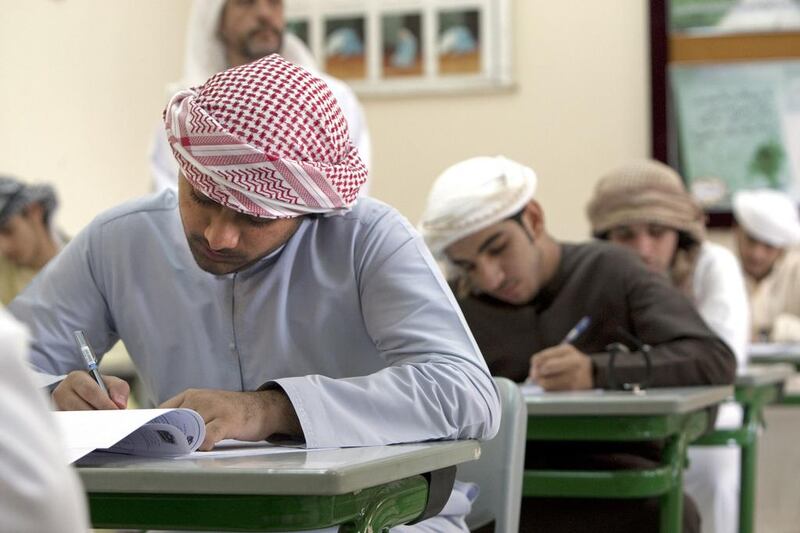 Students takes their exam at the end of the school year at the Al Rams Secondary School for Boys in Ras Al Khaimah. Jeff Topping / The National 



 