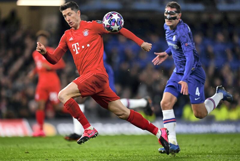 LONDON, ENGLAND - FEBRUARY 25: Robert Lewandowski of Bayern Munich is closed down by Andreas Christensen of Chelsea  during the UEFA Champions League round of 16 first leg match between Chelsea FC and FC Bayern Muenchen at Stamford Bridge on February 25, 2020 in London, United Kingdom. (Photo by Clive Mason/Getty Images)