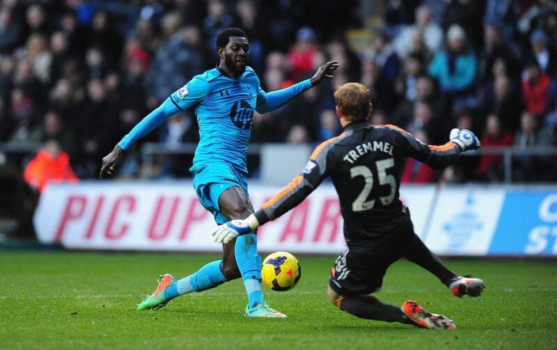 Centre forward: Emmanuel Adebayor, Tottenham. The revitalised striker added two more goals to his tally in the win at Swansea. Stu Forster / Getty Images