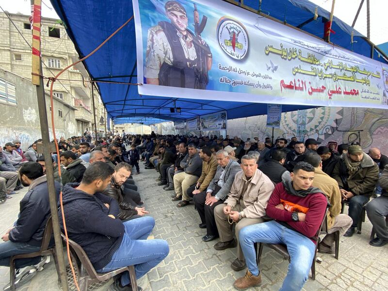 Men attend the funeral of Mohammed Al-Na'em