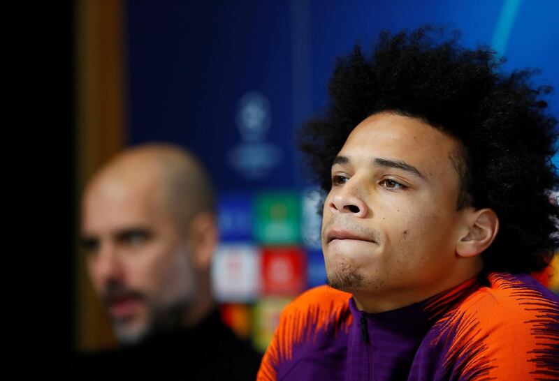 Soccer Football - Champions League - Manchester City Press Conference - The City Football Academy, Manchester, Britain - December 11, 2018   Manchester City manager Pep Guardiola and Manchester City's Leroy Sane during the press conference   Action Images via Reuters/Jason Cairnduff
