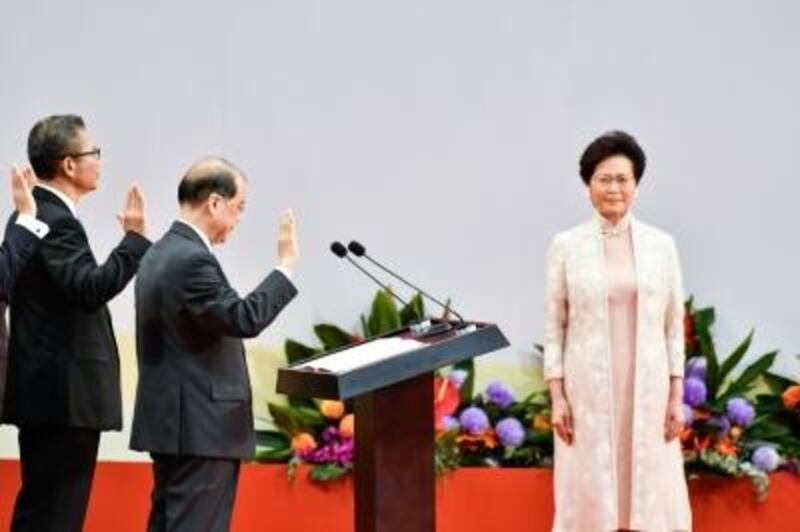 Carrie Lam, right, was sworn in as Hong Kong's new Chief Executive with her new cabinet during an inauguration ceremony in Hong Kong, China on July 1, 2017. Keith Tsuji/Getty Images