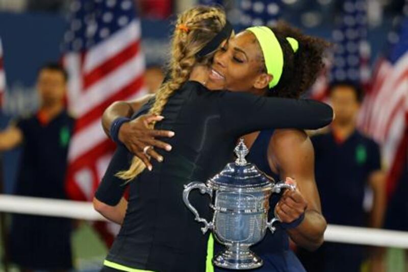 Victoria Azarenka embraces her rival Serena Williams after the Olympic champion wins the US Open in New York