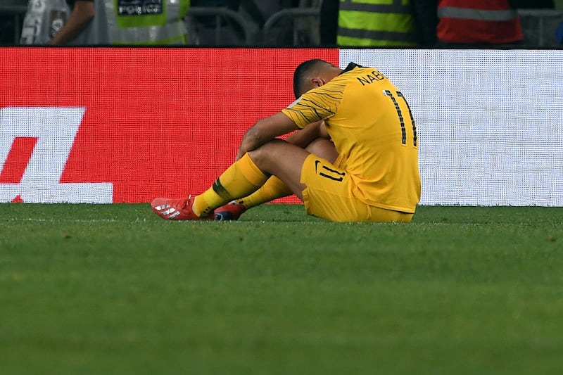 The result is to much to bear for Australia's Andrew Nabbout. EPA