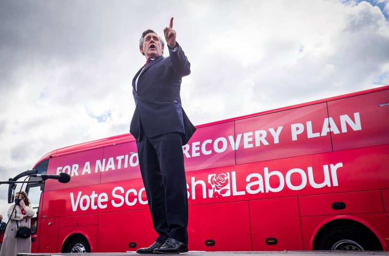 Former Prime Minister Gordon Brown speaks at a Scottish Labour drive-in rally in Glasgow, Scotland, during campaigning for the Scottish Parliamentary election, Wednesday May 5, 2021. Scotland holds an election Thursday that could hasten the breakup of the United Kingdom. The pro-independence Scottish National Party is leading in the polls and a big victory will give it the the moral right and the political momentum to hold a referendum on whether Scotland should end its three-century union with England.  (Jane Barlow/PA via AP)