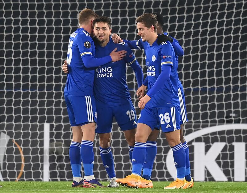 Leicester City's Cengiz Under celebrates with teammates after scoring. PA