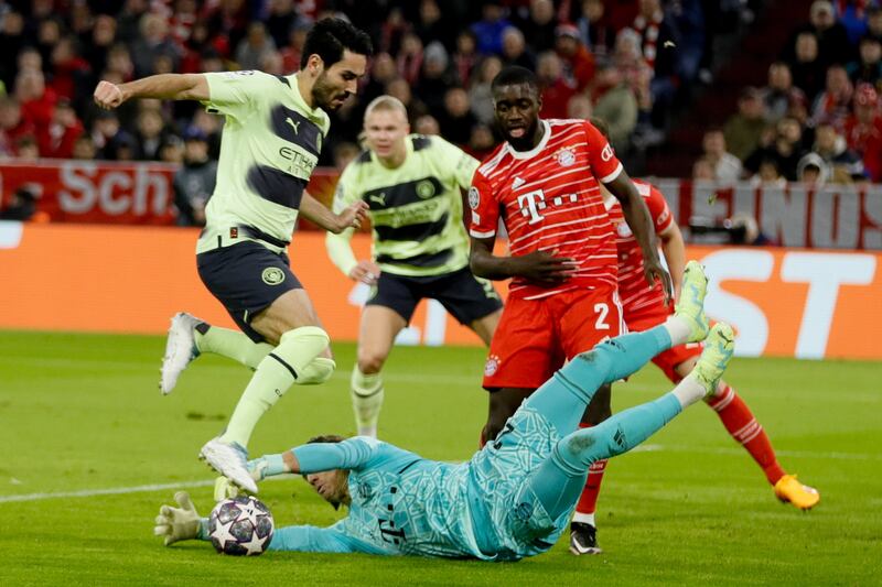 Yann Sommer of Bayern Munich saves at the feet of Ilkay Gundogan of Manchester City. EPA 