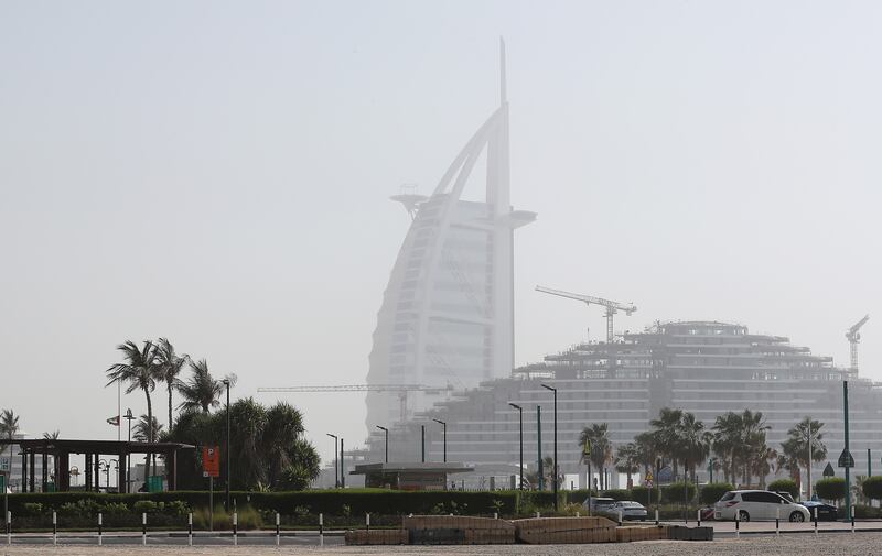Dubai's Burj Al Arab hotel in the haze. Pawan Singh / The National