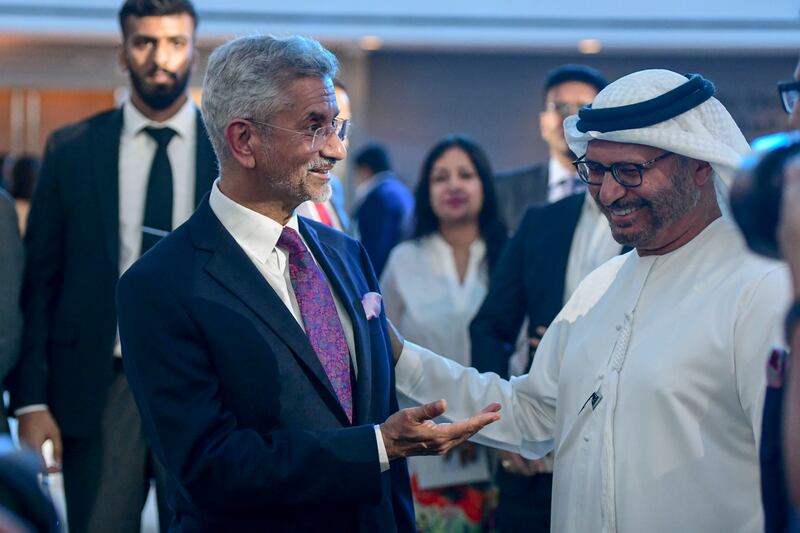 Subrahmanyam Jaishankar, India's foreign minister, and Dr Anwar Gargash, diplomatic adviser to President Sheikh Mohamed, share a light moment at the India Global Forum on Al Maryah Island on Monday. Khushnum Bhandari / The National