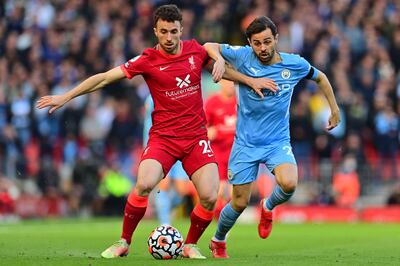 Diogo Jota, left, has become a key player at Liverpool having slipped through the net at Atletico Madrid. AFP