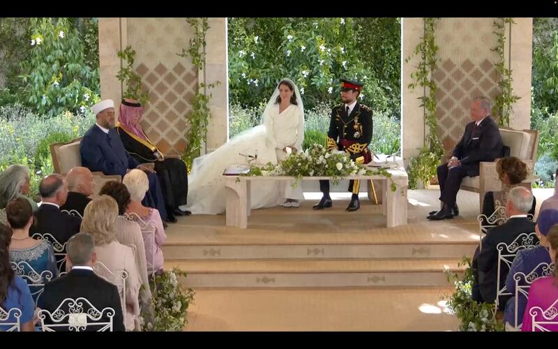 Prince Hussein, Princess Rajwa and King Abdullah at the royal wedding ceremony. Reuters