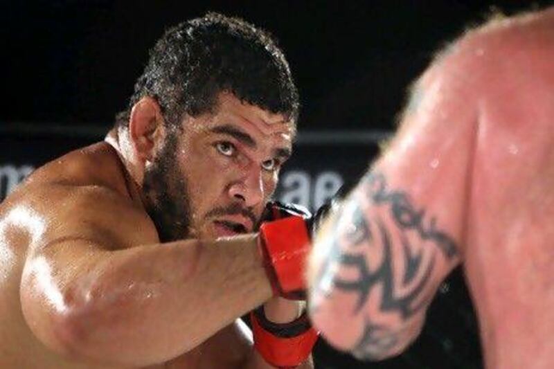 October 22, 2010/ Abu Dhabi / Marcos Oliveira, left, fights Neil Wain during the final bout of Abu Dhabi Fight Championship's Round 2 in Abu Dhabi October 22, 2010. Oliveira won the fight by decision. (Sammy Dallal / The National)