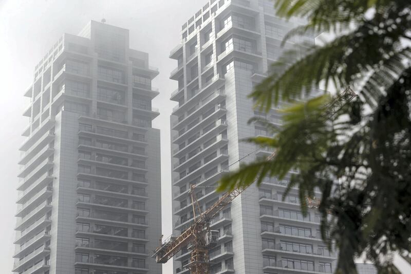 DUBAI, UNITED ARAB EMIRATES. 02 APRIL 2020. Weather picture during the time of the COVID-19 Stay At Home campaign in Dubai. Fog engulfs the tall buildings around the Barsha Heights area. (Photo: Antonie Robertson/The National) Journalist: Standalone. Section: National.