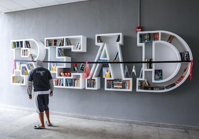 Dubai, U.A.E, December 31, 2016.
Pakistan Youth Forum of Pakistan Association Dubai – has installed a book shelf at a Transguard staffing facility in Dubai.  A Transguard employee checks out a reading book shelf before it's formal opening.  Victor Besa for The National
ID: 39804
Reporter:  Amna shahid
The Natiional 7 *** Local Caption ***  VB_123116_na-book-1.jpg