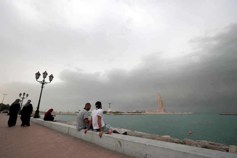 Abu Dhabi, United Arab Emirates - November 10, 2019: Dark clouds and rain batter the Abu Dhabi Coast. Sunday the 10th of November 2019. Abu Dhabi. Chris Whiteoak / The National