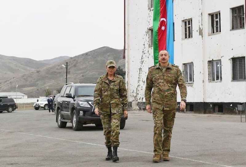 epa08825759 A handout photo made available by Azerbaijan's Defence Ministry shows Azerbaijan's President Ilham Aliyev (R) and first lady Mehriban Aliyeva (L) during their visit to Fuzuli and Jabrayil districts of Azerbaijan, 16 November 2020 (issued 17 November 2020). On 09 November Azerbaijan President Ilham Aliyev, Armenian Prime Minister Nikol Pashinyan and Russian President Putin signed a statement announcing a complete ceasefire and halt of all military operations in the Nagorno-Karabakh conflict zone. Armed clashes erupted on 27 September 2020 in the simmering territorial conflict between Azerbaijan and Armenia over the Nagorno-Karabakh territory along the contact line of the self-proclaimed Nagorno-Karabakh Republic (also known as Artsakh).  EPA/AZERBAIJAN DEFENCE MINISTRY/HO HANDOUT MANDATORY CREDIT/BEST QUALITY AVAILABLE HANDOUT EDITORIAL USE ONLY/NO SALES