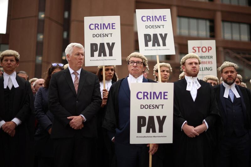Barristers on strike outside Liverpool Crown Court. Reuters
