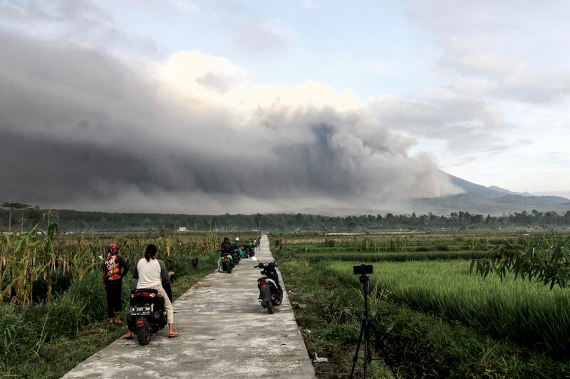 Mount Semeru spews volcanic materials to the air in Lumajang, East Java. The 3,376-metre volcano is one of the most active on Java. EPA