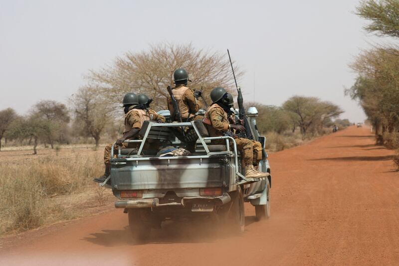 Soldiers patrol the road of Gorgadji, Burkina Faso, in the Sahel region in 2019. Reuters