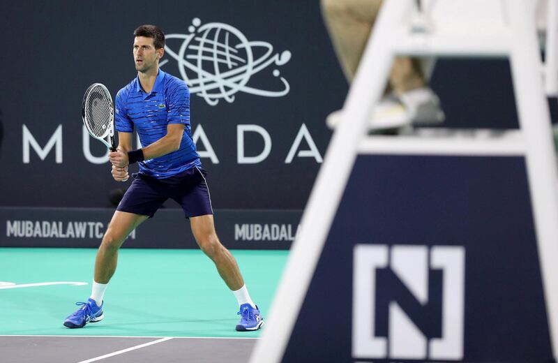 Abu Dhabi, United Arab Emirates - Reporter: Jon Turner: Novak Djokovic plays a shot during the third place play-off between Novak Djokovic v Karen Khachanov at the Mubadala World Tennis Championship. Saturday, December 21st, 2019. Zayed Sports City, Abu Dhabi. Chris Whiteoak / The National