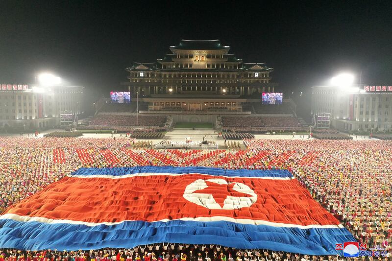 A giant North Korean flag at Kim Il Sung Square.  AFP