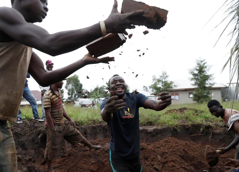 Men make bricks in Bunia, eastern Democratic Republic of Congo. Goran Tomasevic / Reuters