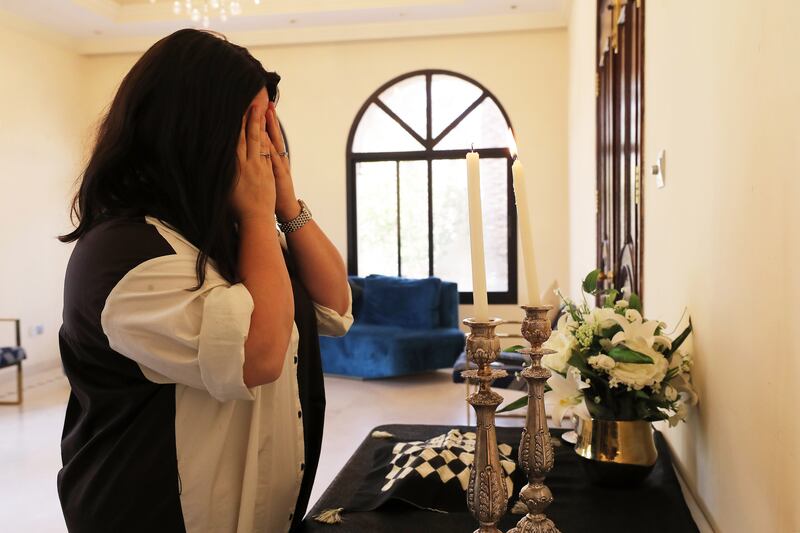 One of the women at the centre performs a prayer at the Jewish Community Centre in Dubai.
