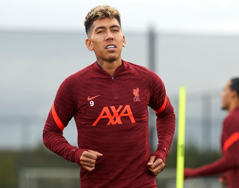 Roberto Firmino of Liverpool during a training session at AXA Training Centre in Kirkby, England. All photos by Getty Images