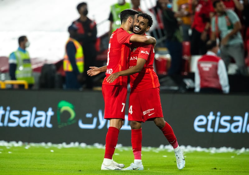 Federico Cartabia of Shabab Al Ahli, left, is congratulated by a teammate after scoring the opening goal. 