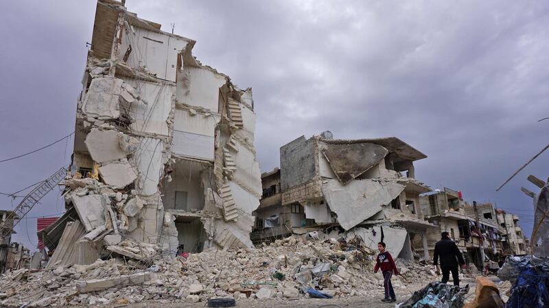 TOPSHOT - This picture taken on March 14, 2019, shows destructions following an airstrike in the jihadist-held city of Idlib, northwestern Syria. Russian air strikes killed at least 13 civilians, including six children, on March 14 in Idlib province, in the first such raids since a September truce deal, a monitor said. The Britain-based Syrian Observatory for Human Rights said around 60 people were also wounded in the air strikes that struck several areas in the northwestern province, which is Syria's last major rebel bastion. / AFP / Muhammad HAJ KADOUR
