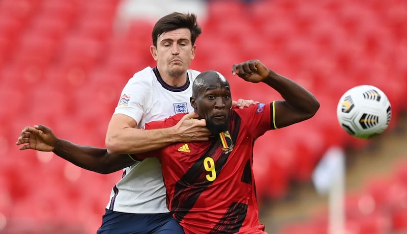 Harry Maguire - 7: He and Dier both struggled against Lukaku's physicality early on but both improved markedly in the second half. AFP