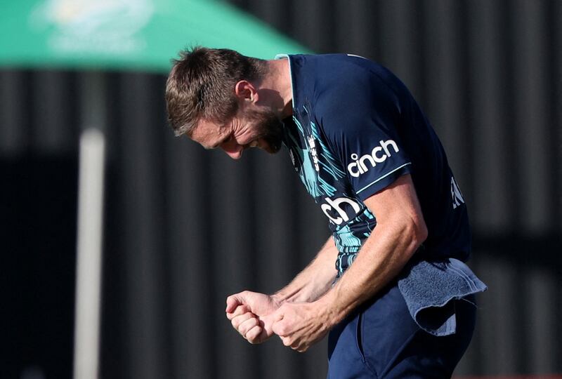 England's Chris Woakes celebrates taking the wicket of South Africa's Temba Bavuma. Reuters