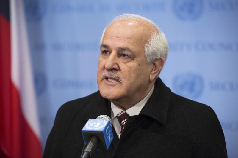 Riyad Mansour, the Palestinian envoy to the United Nations, speaks to reporters at the UN after submitting requests for accession to the body’s international conventions on January 2, 2015.  Evan Schneider / United Nations / EPA
