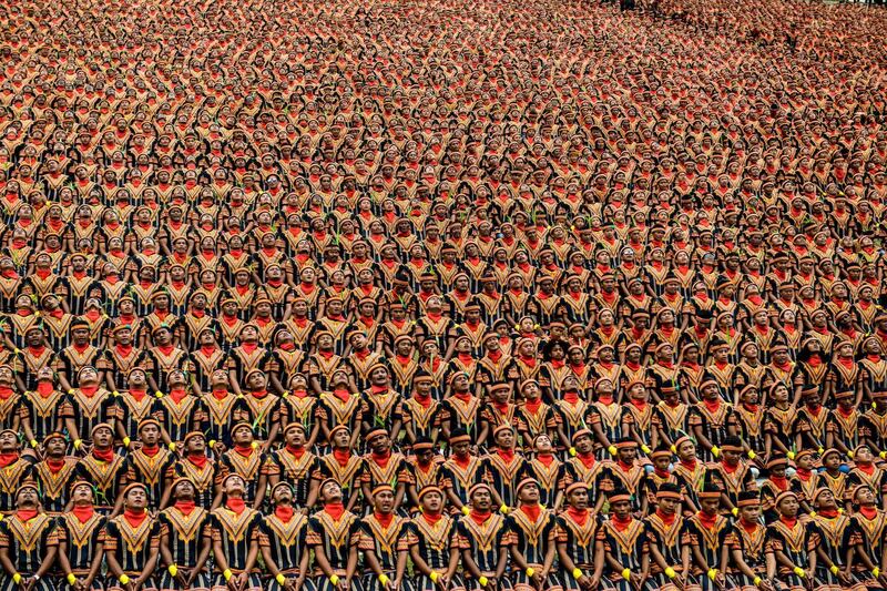 Indonesian men take part in a rehearsal of a mass traditional Saman dance - known as the "dance of a thousand hands". Chaideer Mahyuddin / AFP Photo / August 12, 2017