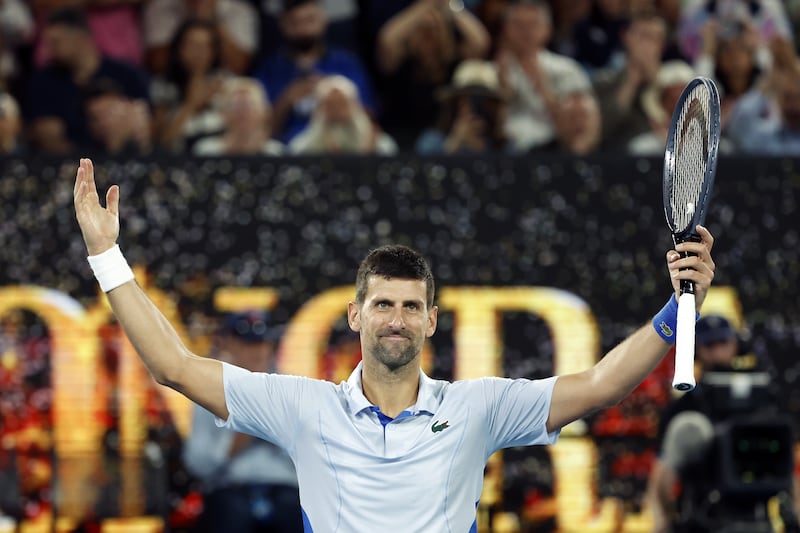 Novak Djokovic celebrates in front of the spectators after beating Adrian Mannarino. EPA