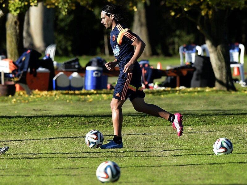 Colombia striker Radamel Falcao shown training as he attempts to recover from surgery on a ruptured cruciate ligament in January. Daniel Garcia / AFP / May 28, 2014  