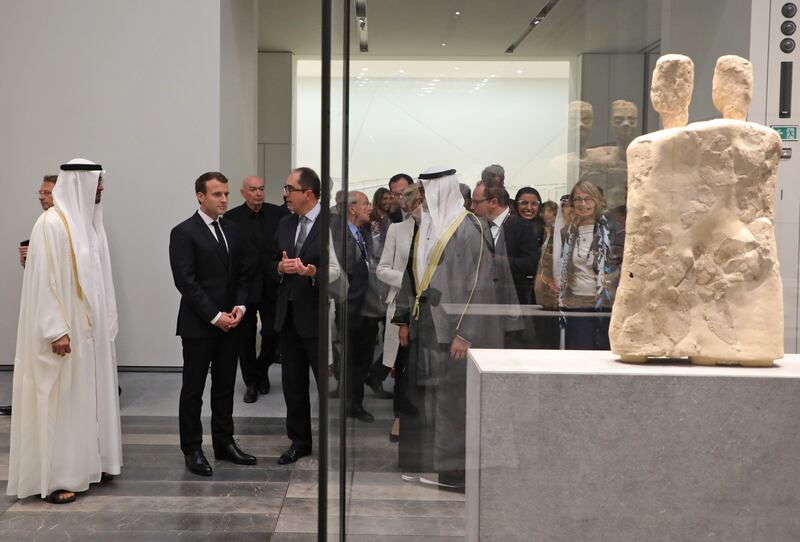The delegation listens to President-Director of the Louvre Museum, Jean-Luc Martinez , during a tour of Louvre Abu Dhabi.  Ludovic Marin / AFP Photo