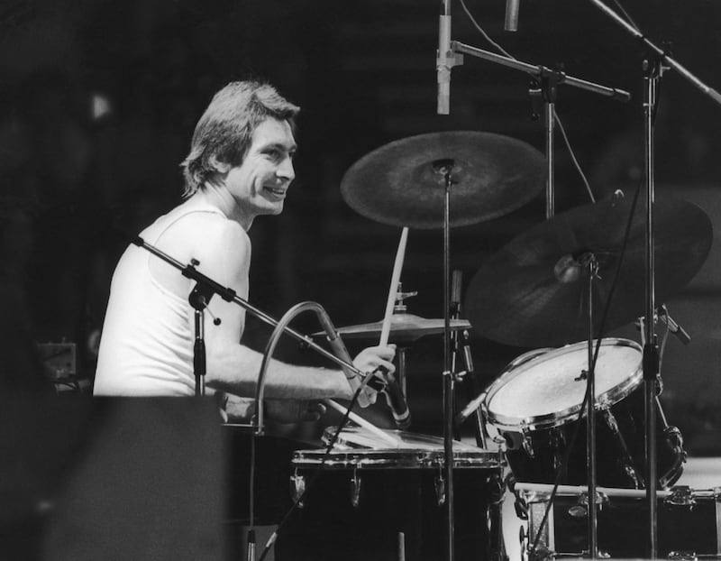 Drummer Charlie Watts of The Rolling Stones, at a British concert and sporting a new David Bowie style feather cut. Getty Images