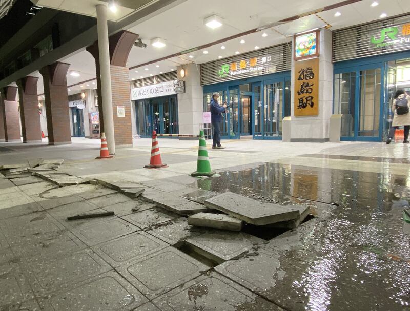Damaged pavement slabs in front of JR Fukushima Station appeared to have cracked due to the impact of the earthquake. AFP