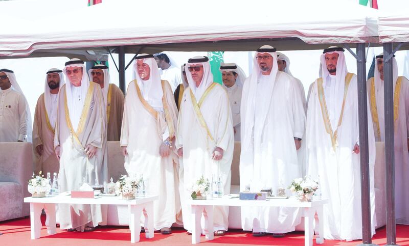 Abu Dhabi, United Arab Emirates - HH Sheikh Hazza Bin Zayed Al Nahyan (middle) HH Sheikh Khaled bin Mohammed bin Zayed Al Nahyan (4th from left) with HE Turkey Al Dakil, ambassador of KSA to UAE (2nd from left) at the renaming of the street in corniche, Abu Dhabi.  Leslie Pableo for The National for Haneen Dajani's story