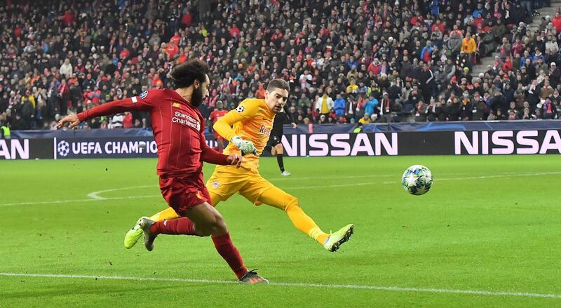 Liverpool's Mohamed Salah scores against Salzburg. AFP