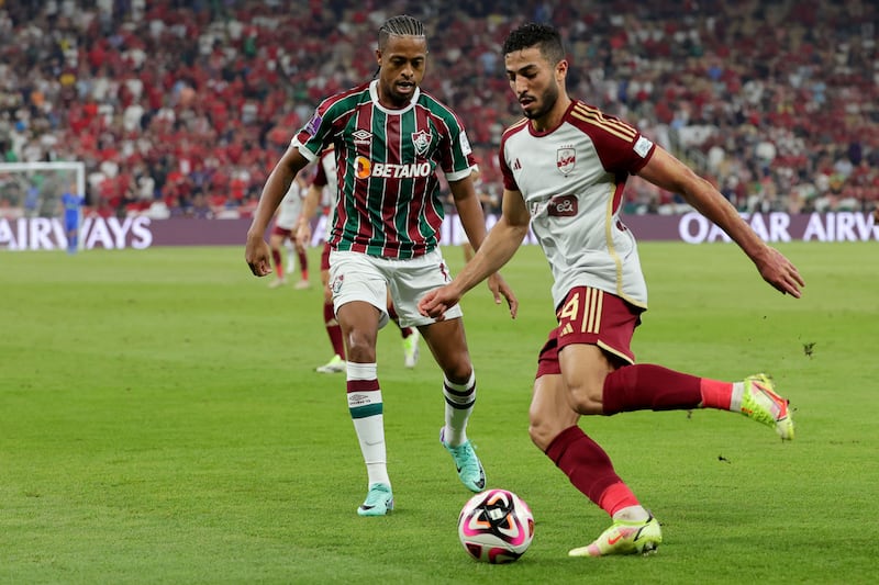 Fluminense's Keno closes down Ahly's Mohamed Abdelmonem. AFP