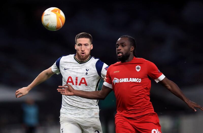 Tottenham Hotspur's Matt Doherty (left) and Royal Antwerp's Jordan Lukaku battle for the ball during the UEFA Europa League Group J match at The Tottenham Hotspur Stadium, London. PA Photo. Picture date: Thursday December 10, 2020. See PA story SOCCER Tottenham. Photo credit should read: Adam Davy/PA Wire. RESTRICTIONS: Editorial use only, no commercial use without prior consent from rights holder.