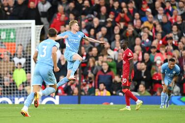 LIVERPOOL, ENGLAND - OCTOBER 03: Kevin De Bruyne of Manchester City celebrates after scoring their side's second goal during the Premier League match between Liverpool and Manchester City at Anfield on October 03, 2021 in Liverpool, England. (Photo by Michael Regan / Getty Images)
