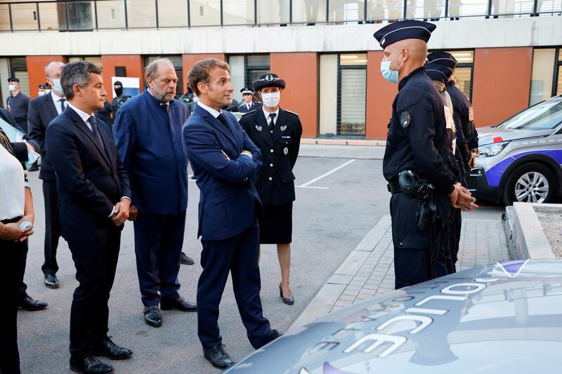 Emmanuel Macron meets police officers on the front line in the southern French port city of Marseille. AFP